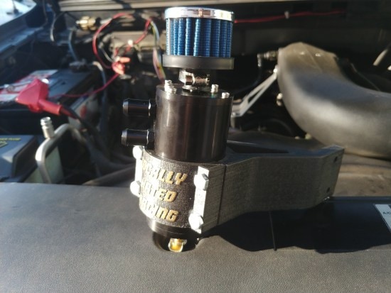 Custom mount, 3D printed in carbon-fiber reinforced nylon, puts aftermarket catch-can in just the right location. (Image courtesy Austin Suder)