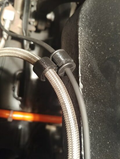 Just-right 3D printed clips keep hoses anchored and out of the way. ((Image courtesy Austin Suder)