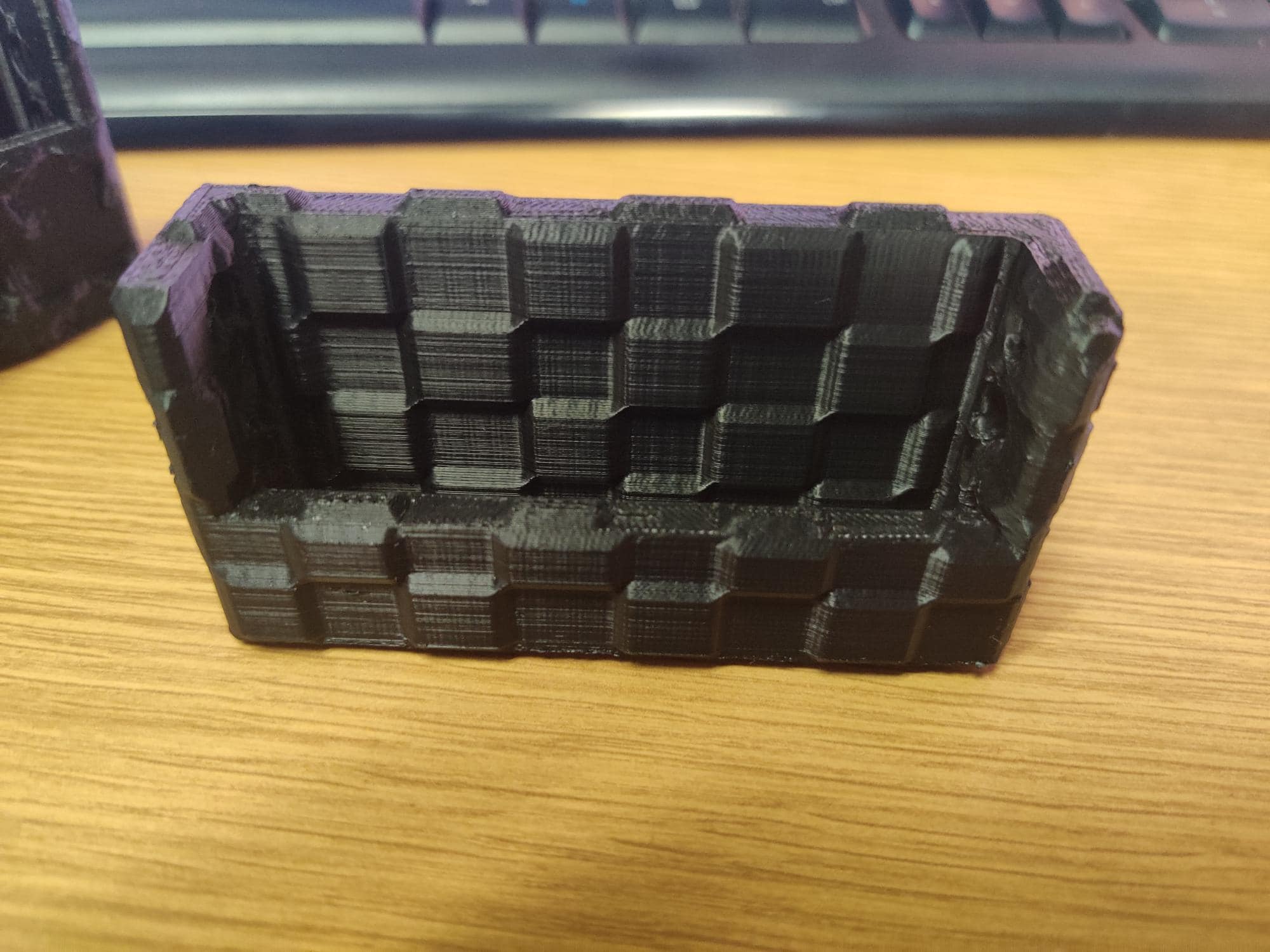 Example of Stratasys FDM part set up to print with a checkerboard surface texture. (Image courtesy PADT Inc.)
