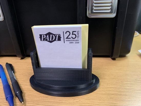 Completed note-holder set up in GrabCAD Print, Advanced FDM mode, weighted toward the bottom but light-weighted internally. Image PADT.