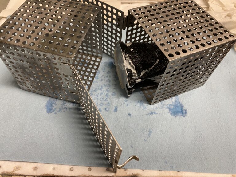 How to attach two small metal baskets to each other, to hold a large 3D printed part inside a Support Cleaning Apparatus tank.