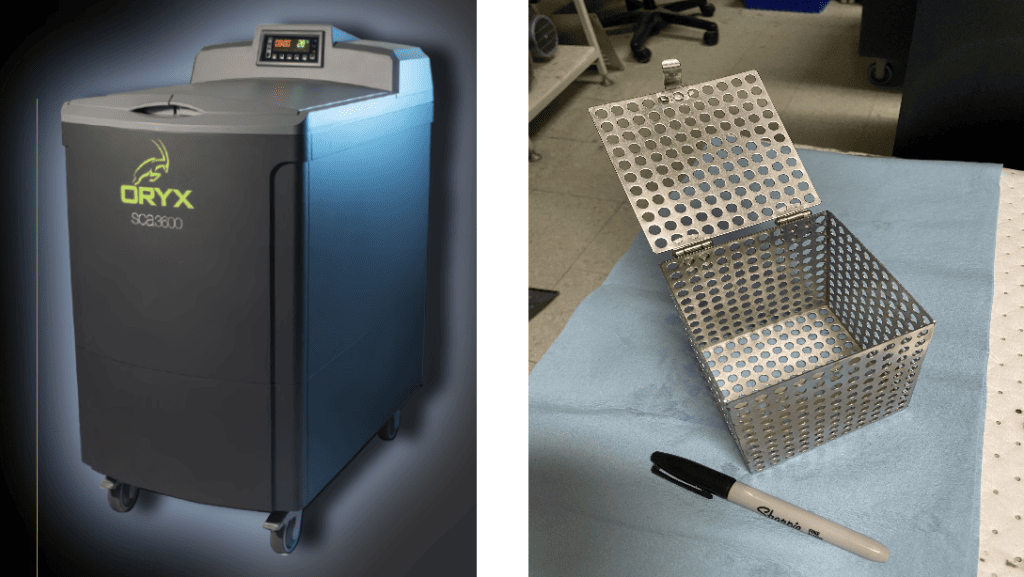 Left: A Support Cleaning Apparatus (SCA) tank from Oryx Additive. This equipment uses heated sodium hydroxide to dissolve support material from a Stratasys 3D printed FDM (filament) part. Right: a small stainless steel perforated cube/box with a lid, to hold 3D printed parts in an SCA tank.